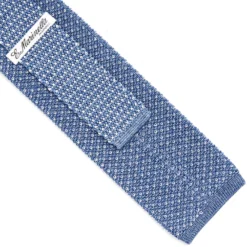 CRAVATTA TRICOT IN SETA AZZURRO POLVERE Microfantasia geometrica