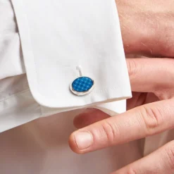 GEMELLI DA POLSO IN ARGENTO AZZURROCon microfantasia fiore