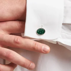 GEMELLI DA POLSO IN ARGENTO VERDECon microfantasia fiore