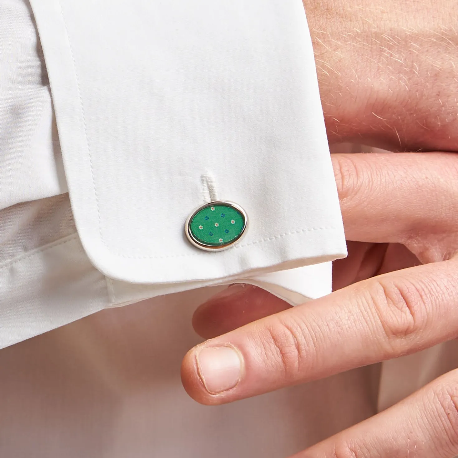 GEMELLI DA POLSO IN ARGENTO VERDE Con microfantasia fiore