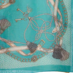 STOLA IN VOILE DI COTONE E SETA VERDE Microfantasia e nappine